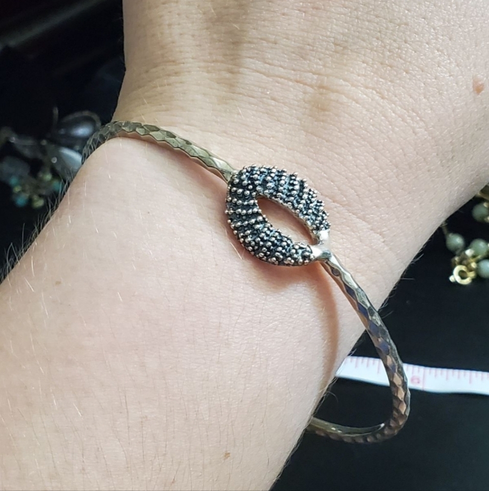 Sterling Michael Dawkins bangle. This is solid sterling silver. Size is about 8